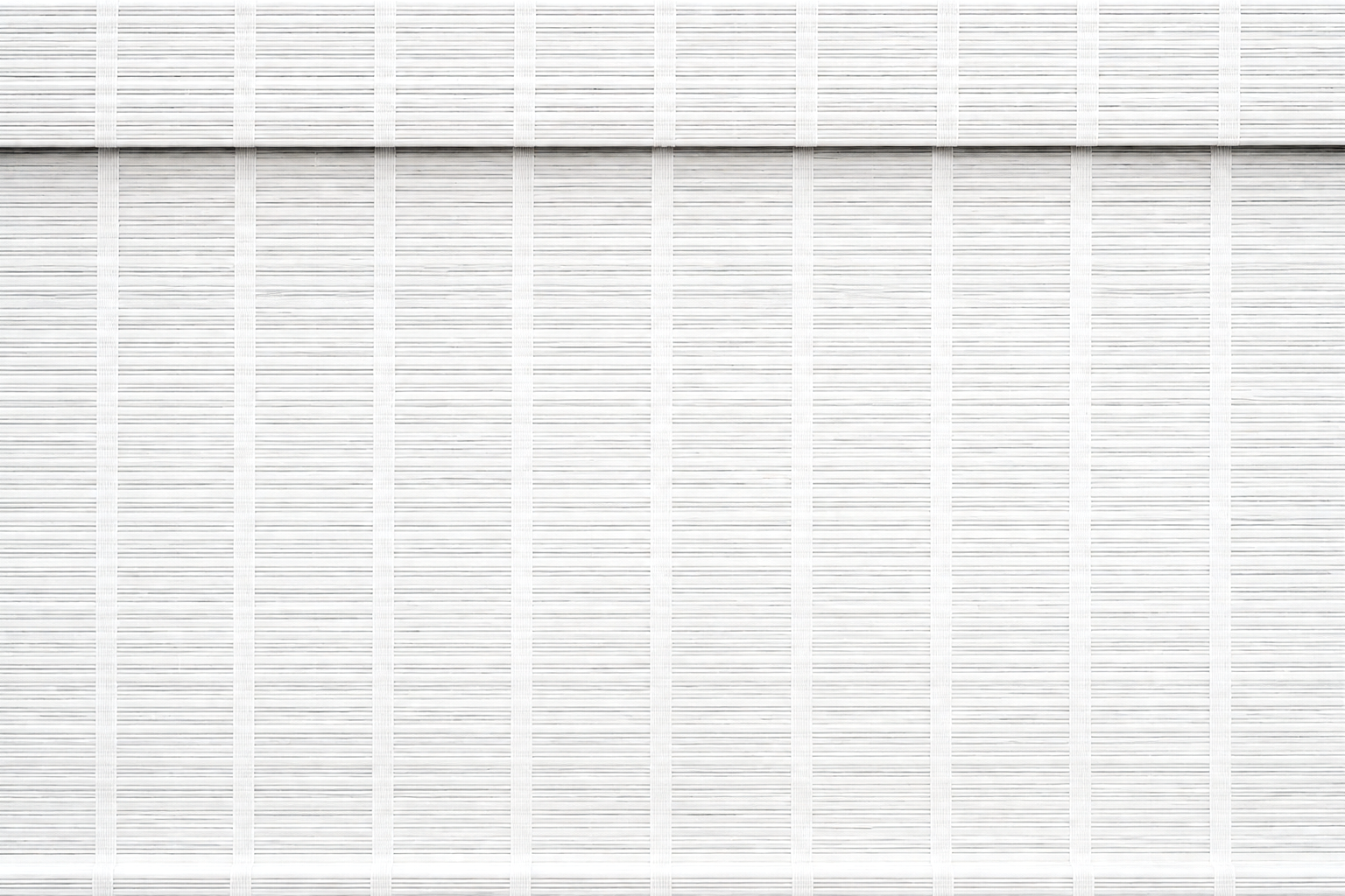 Whitewash bamboo roman shade
